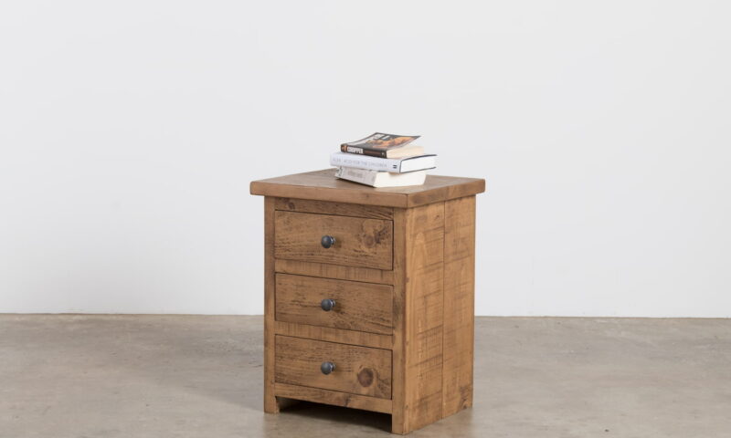 A solid pine bedside cabinet