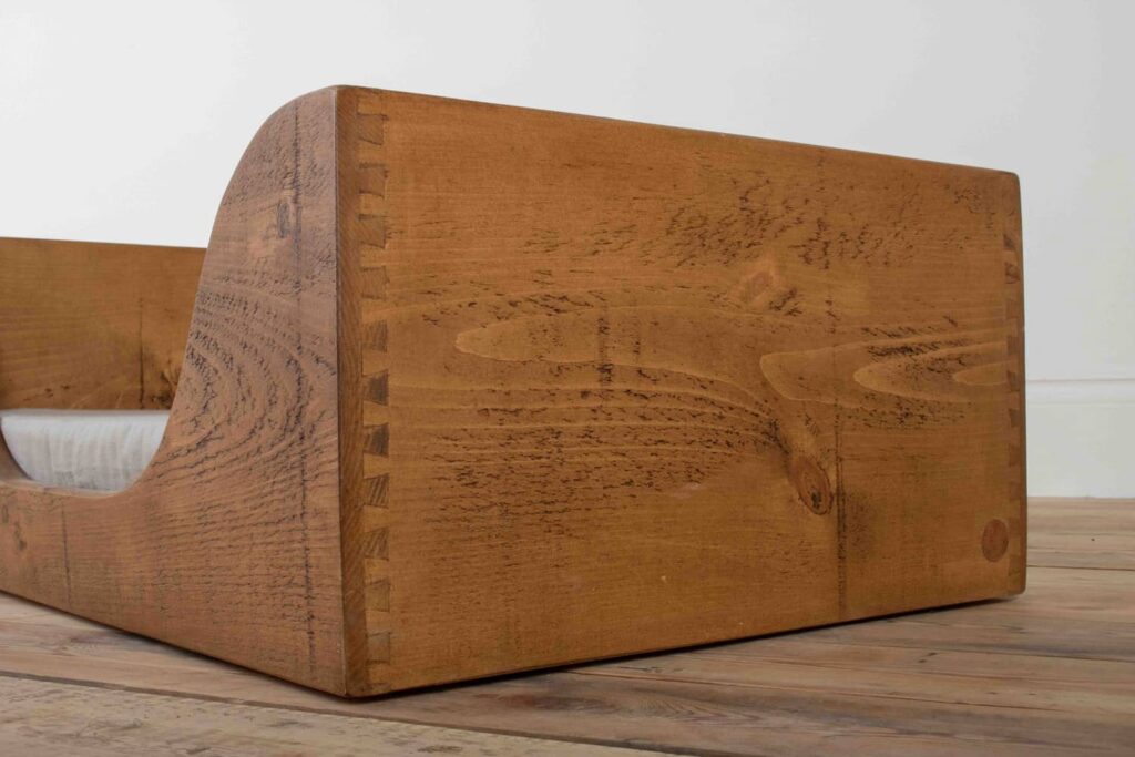 The Dovetailed Dog Bed in a chunky wooden furniture style The Benefits of Handmade Wooden Furniture